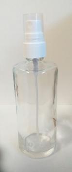 Clear glass bottle with pump spray head